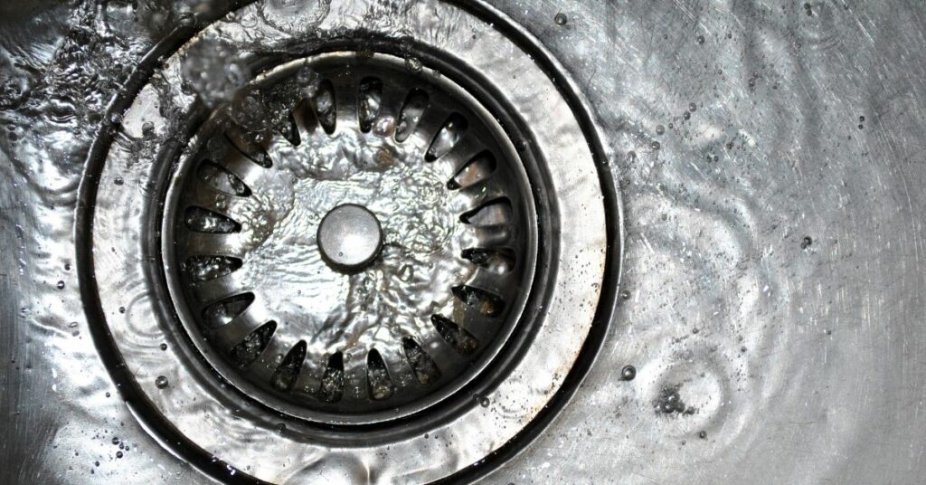 clean sink drain with clean water