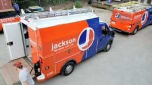Jackson Services heating and air trucks respond to a call for service.